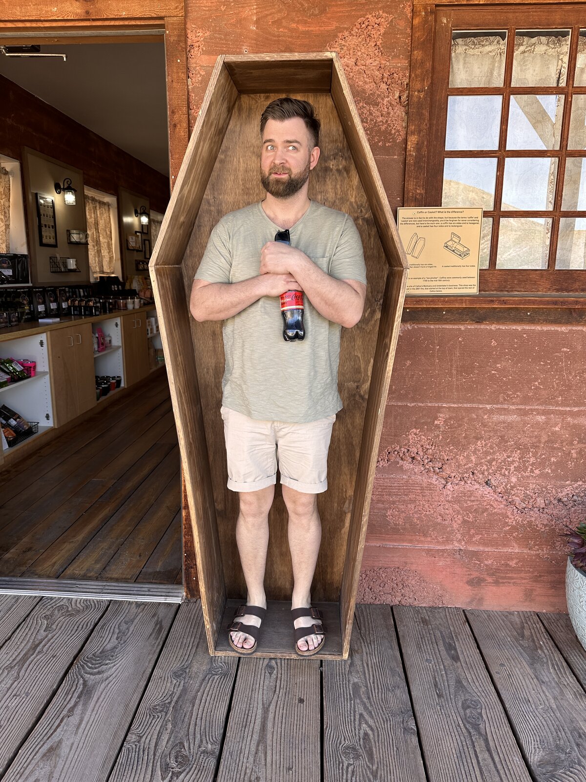 Martin posing in a coffin — Exhibit A