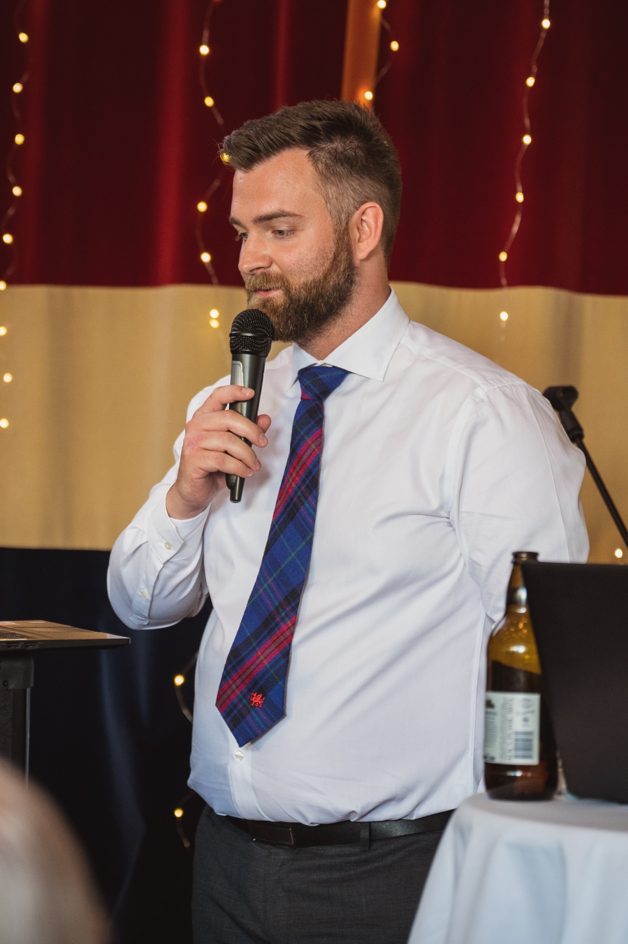 Martin giving his speech, microphone in hand